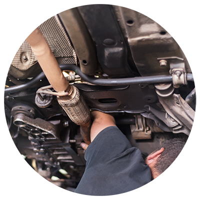 Working on exhaust for MOT test